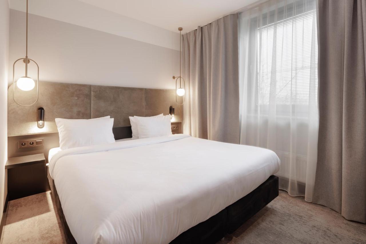 Royal Tulip Sand Колобжег Екстериор снимка A bedroom at the hotel
